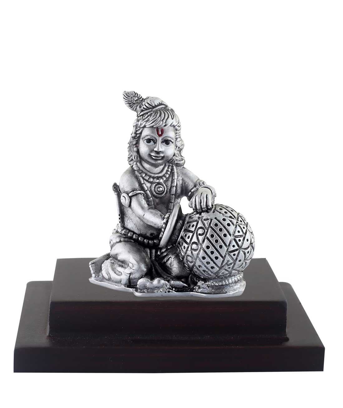 bal gopal idol on wooden base