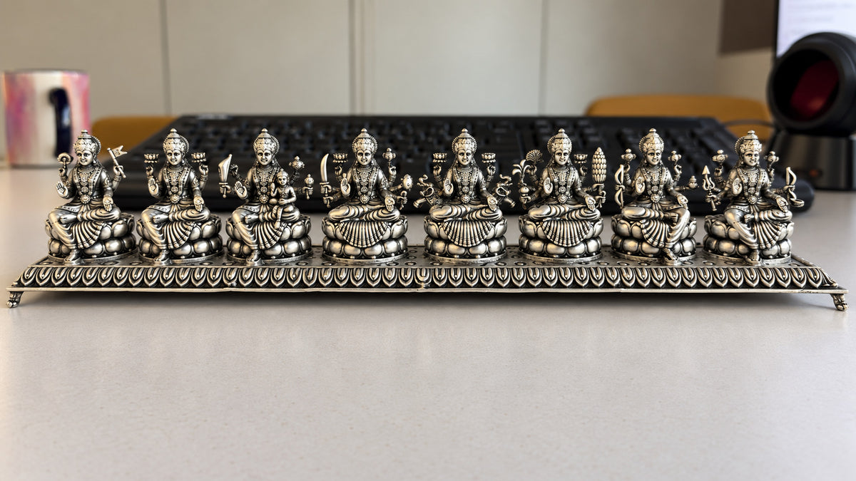 925 silver Ashta Lakshmi idol set displayed in an interior setting
