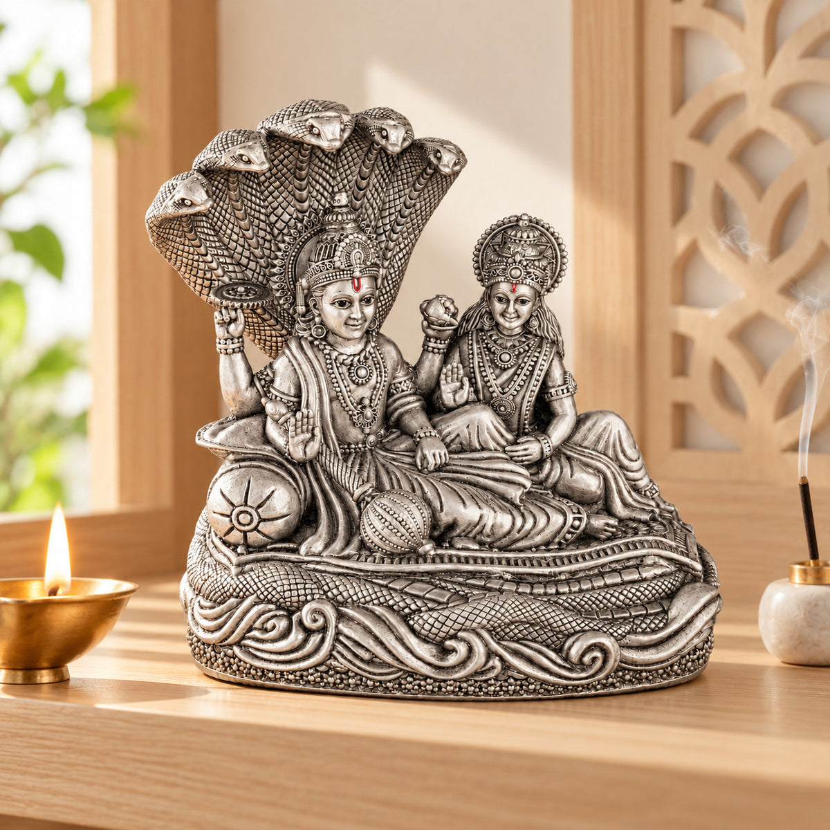925 silver Narayan Laxmi idol under Sheshnag displayed in a home interior