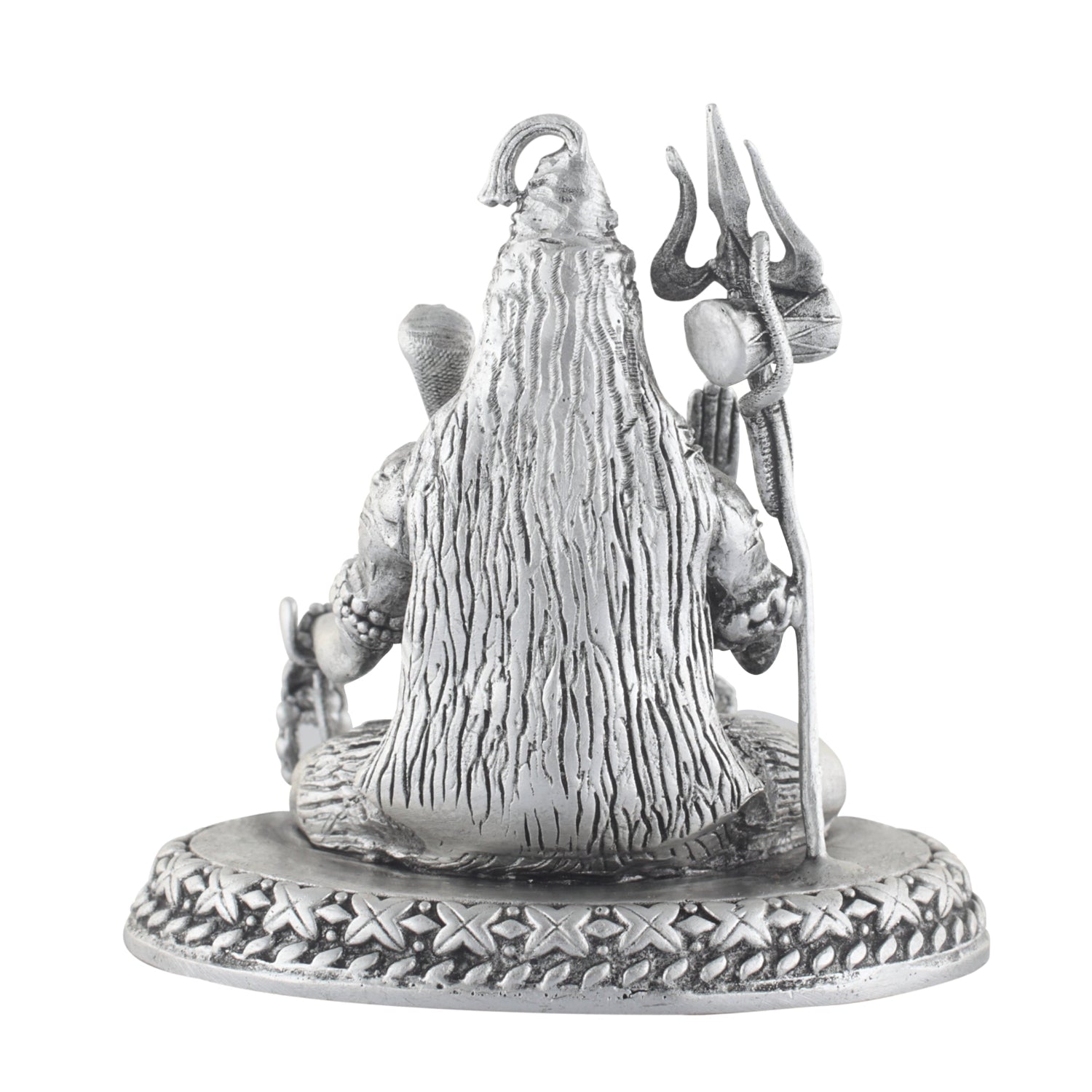 Silver statue of a shiva with a long hair and traditional attire on a white background