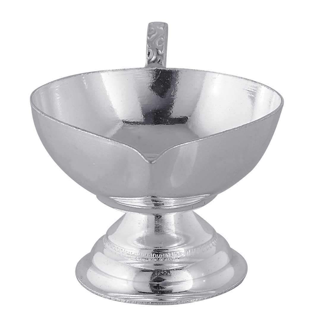 Silver pedestal oil lamp on a white background