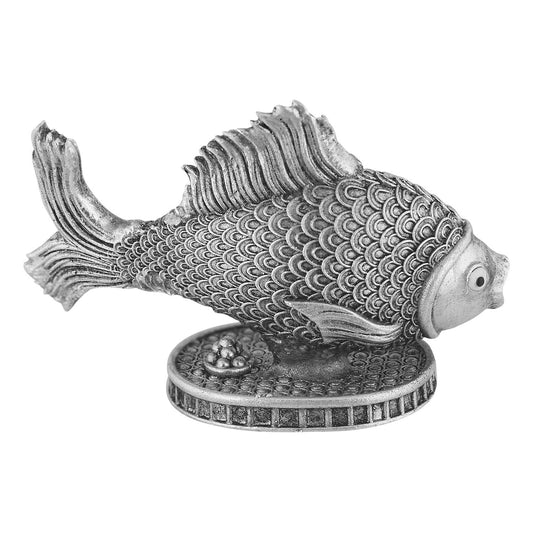 Decorative fish figurine on a white background