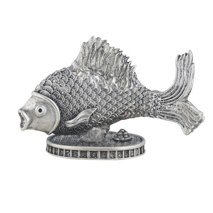 Decorative fish sculpture on a white background