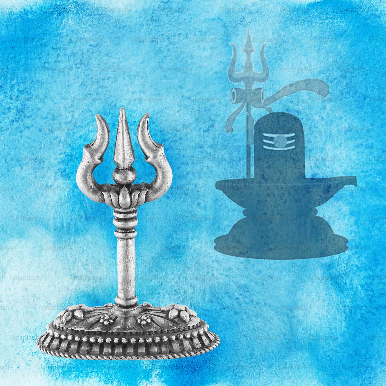 Decorative silver trident on a blue background